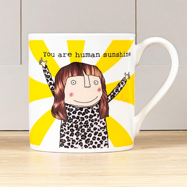mug with an image of a woman and sun rays, caption reads 'you are human sunshine'
