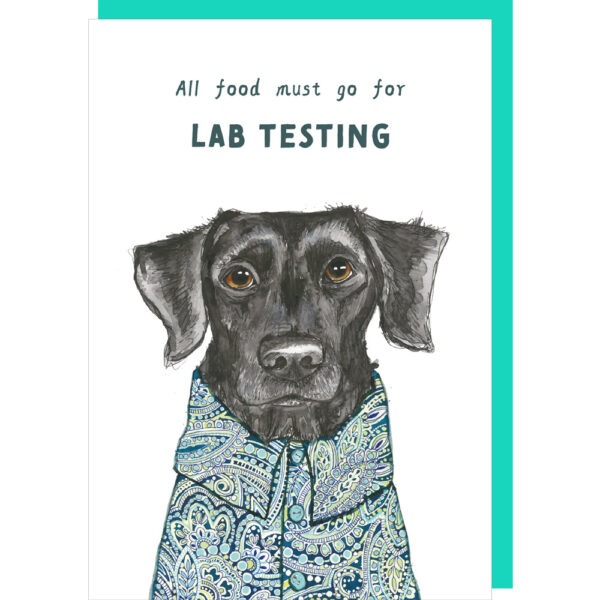 Birthday card, white background with a image of a black Labrador dog dressed in a blue and green paisley pattern shirt, caption reads 'All food must go for lab testing'.