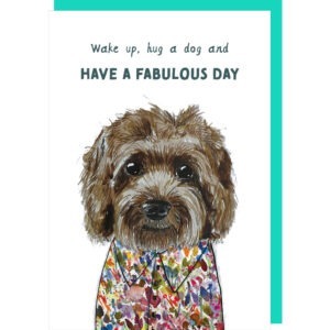 white birthday card, with a illustration of a sweet cockapoo in a shirt, caption reads 'wake up, hug a dog and have a fabulous day'.