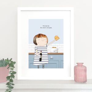 art print, unframed - image of a woman in a kitchen holding a bottle of wine and toast, text reads 'follow me for more recipes'.