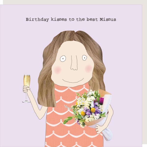Wife kisses birthday card.